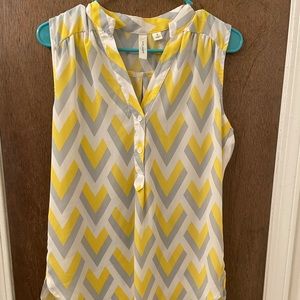 Pretty yellow and gray top.